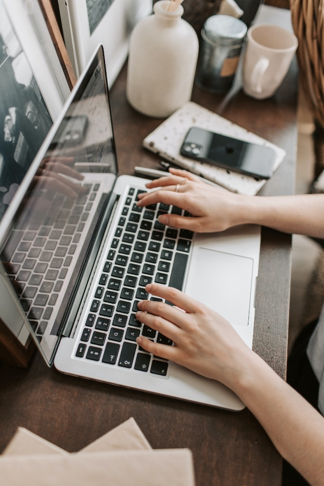 : a person using laptop at home