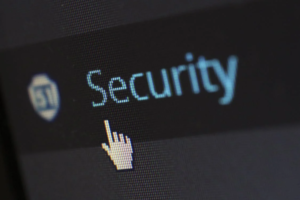 A cursor pointing to the security icon on the screen