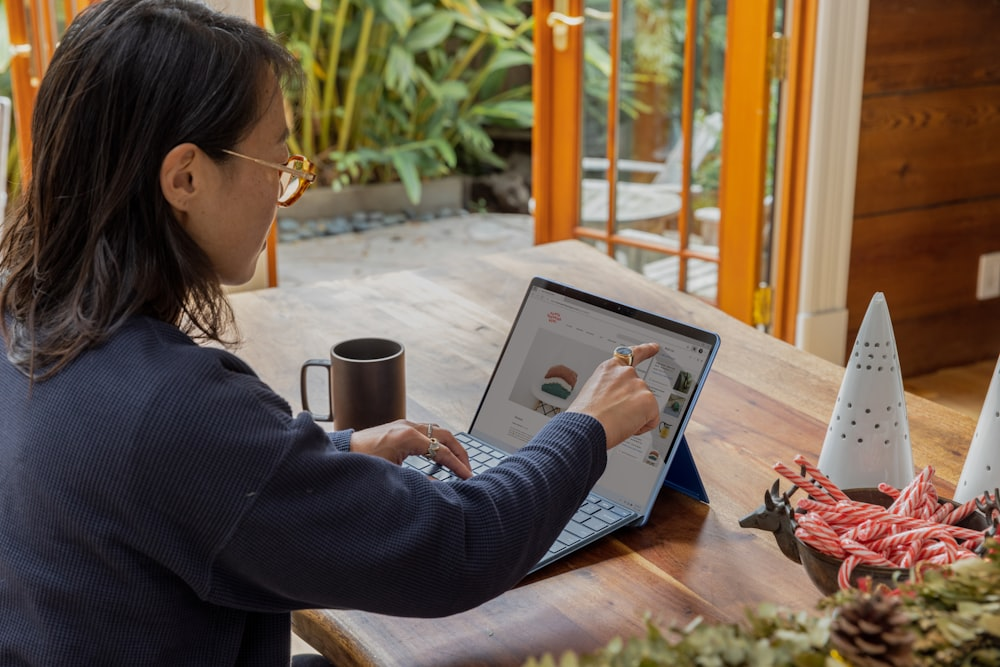 a woman working on her laptop.